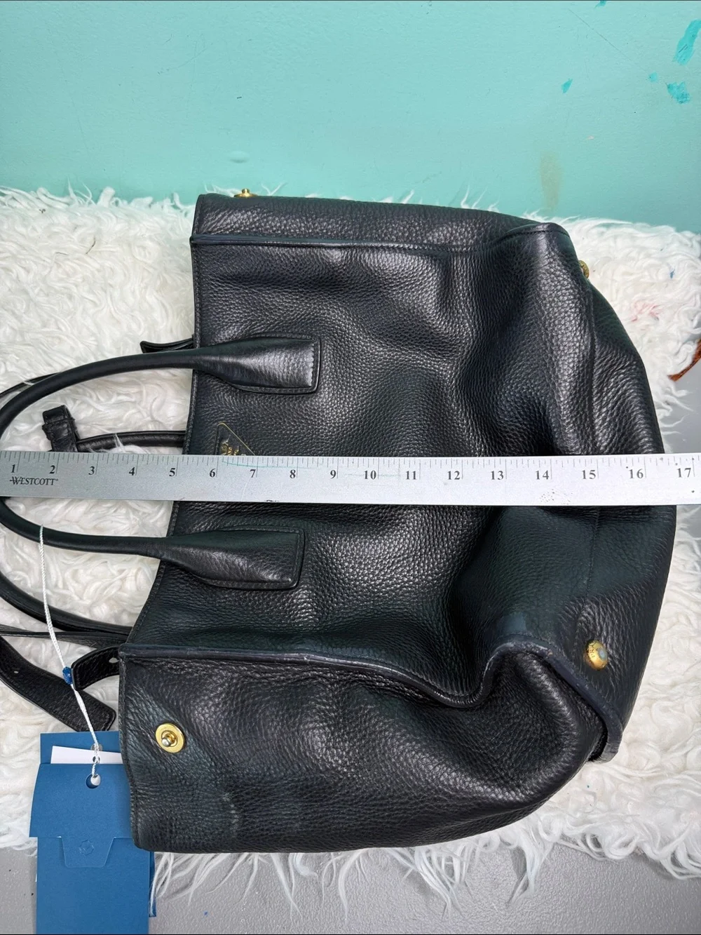 Authentic Prada Black  Leather Satchel with Gold Logo .
